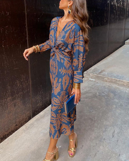 Anita – Abito Elegante con Scollo a V, Maniche Lunghe e Fantasia